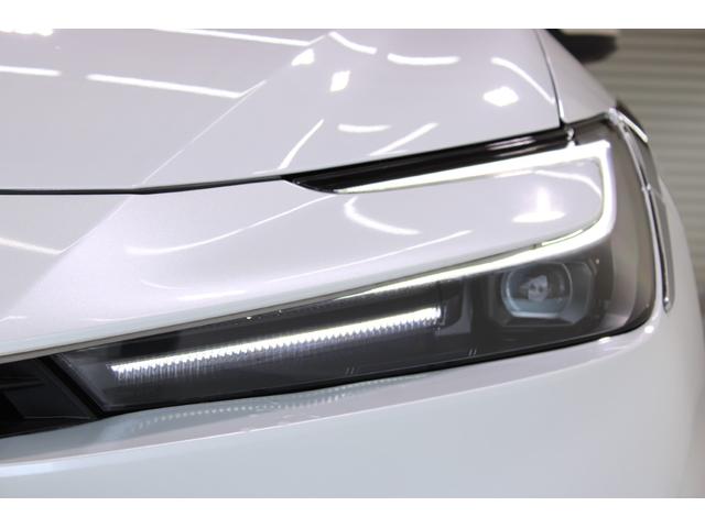 プリウス Z 禁煙車 4WD GRパフォーマンスPKG パノラマルーフ 12.3インチ純正ナビ 全周囲カメラ フルセグTV 温冷黒革シート パワーシート レーダークルーズコントロール 電動Rゲート ETC2.0(16枚目)