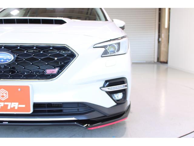 レヴォーグ ＳＴＩスポーツ　ＥＸ　禁煙車　ＳＴＩフルエアロ　ＳＴＩマフラー　純正１１．６インチナビ　バックカメラ　サイドカメラ　フルセグＴＶ　メモリー付き温熱赤黒革パワーシート　アイサイト　電動リアゲート　デジタルインナーミラー（15枚目）