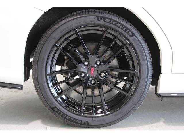 レヴォーグ ＳＴＩスポーツ　ＥＸ　禁煙車　ＳＴＩフルエアロ　ＳＴＩマフラー　純正１１．６インチナビ　バックカメラ　サイドカメラ　フルセグＴＶ　メモリー付き温熱赤黒革パワーシート　アイサイト　電動リアゲート　デジタルインナーミラー（24枚目）