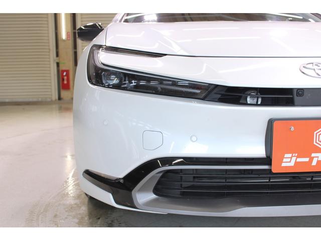 プリウス Z 禁煙車 サンルーフ 純正12.3型ディスプレイオーディオプラス フルセグTV 全周囲カメラ 寒冷地仕様 温冷黒革シート ステアリングヒーター 100V電源 ブラインドスポットモニター 電動リアゲート(18枚目)