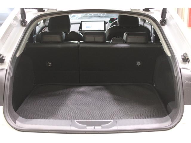 プリウス Z 禁煙車 サンルーフ 純正12.3型ディスプレイオーディオプラス フルセグTV 全周囲カメラ 寒冷地仕様 温冷黒革シート ステアリングヒーター 100V電源 ブラインドスポットモニター 電動リアゲート(34枚目)