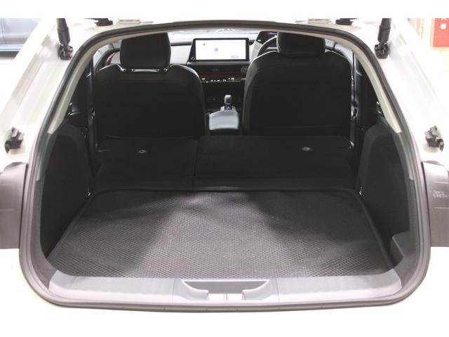 プリウス Z 禁煙車 サンルーフ 純正12.3型ディスプレイオーディオプラス フルセグTV 全周囲カメラ 寒冷地仕様 温冷黒革シート ステアリングヒーター 100V電源 ブラインドスポットモニター 電動リアゲート(35枚目)