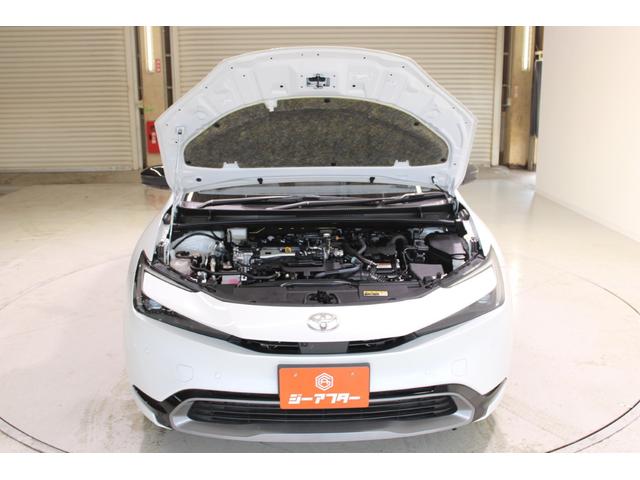 プリウス Z 禁煙車 サンルーフ 純正12.3型ディスプレイオーディオプラス フルセグTV 全周囲カメラ 寒冷地仕様 温冷黒革シート ステアリングヒーター 100V電源 ブラインドスポットモニター 電動リアゲート(69枚目)