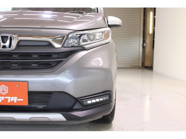 フリード＋ハイブリッド ハイブリッド・クロスターホンダセンシング　禁煙車　ホンダインターナビ　フルセグＴＶ　バックカメラ　シートヒーター　両側パワースライドドア　ＬＥＤヘッドライト　ＬＥＤフォグライト　純正１５インチアルミホイール　ルーフレール　ハーフレザーシート（16枚目）
