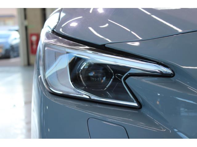 レヴォーグ ＳＴＩスポーツ　ＥＸ　禁煙車　純正１１．６インチナビ　フロントサイドバックカメラ　フルセグＴＶ　アイサイトＸテクノロジー　スマートリアビューカメラ　シートヒーター　赤黒革シート　メモリ付パワーシート　電動リアゲート　ＬＥＤ（19枚目）