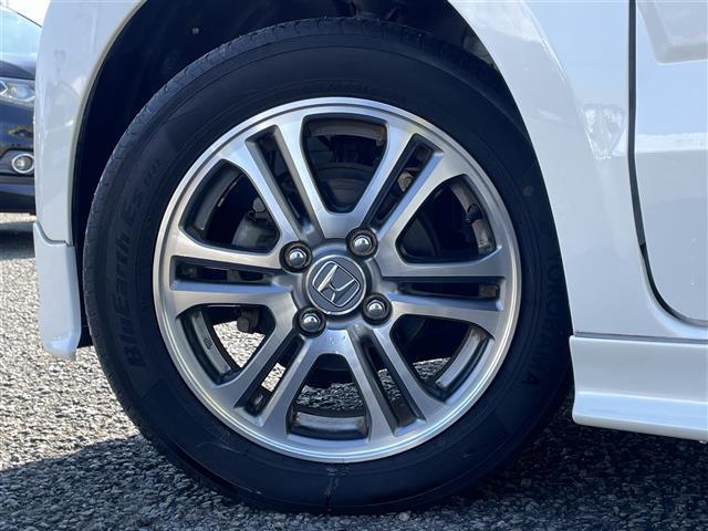 N-BOXカスタム G SSパッケージ 純正ナビゲーション バックカメラ 両側パワースライドドア HIDヘッドライト フォグランプ TRC アイドリングストップ 両席シートヒーター 社外アルミ積み込み プッシュスタート スマートキー(12枚目)