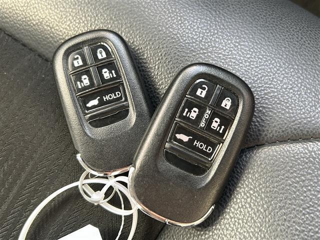 ステップワゴン e:HEVスパーダ 禁煙 純正11.4型ナビ 15.6型フリップダウンモニター 前後ドライブレコーダー オットマン パワーバックドア BSI ホンダセンシング シートヒーター コンビシート トリプルゾーンエアコン ETC(23枚目)