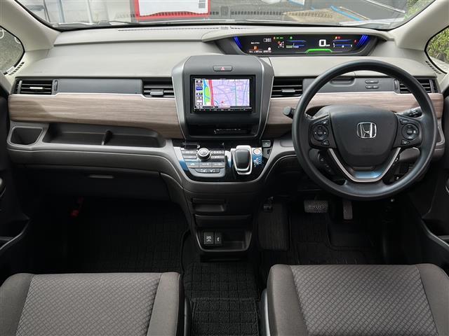 フリードハイブリッド ハイブリッド・Ｇ　禁煙　７人乗　社外ナビ　バックカメラ　シートヒータ　ホンダセンシング　レーダークルーズコントロール　両側パワースライドドア　ＬＥＤヘッドライト　アクティブコーナリングライト　ロールサンシェード（42枚目）