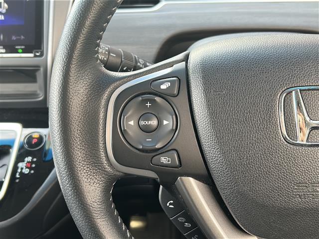 フリードハイブリッド ハイブリッド・Gホンダセンシング 禁煙 純正9型ナビ バックカメラ Sパッケージ Cパッケージ LEDヘッドライト アクティブコーナリングライト 両側パワースライドドア ハーフレザー 革巻きステアリング 前後ドライブレコーダー ETC(13枚目)