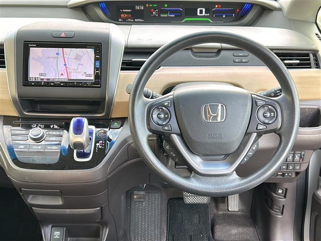 フリードハイブリッド ハイブリッド・Gホンダセンシング 禁煙 純正ナビ バックカメラ Cパッケージ LEDヘッドライト アクティブコーナリングライト コンフォートビューパッケージ 両側パワースライドドア ドライブレコーダー ETC ドアバイザー(2枚目)