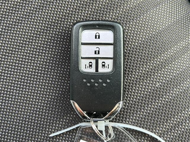 フリードハイブリッド ハイブリッド・Gホンダセンシング 禁煙 純正ナビ バックカメラ Cパッケージ LEDヘッドライト アクティブコーナリングライト コンフォートビューパッケージ 両側パワースライドドア ドライブレコーダー ETC ドアバイザー(16枚目)