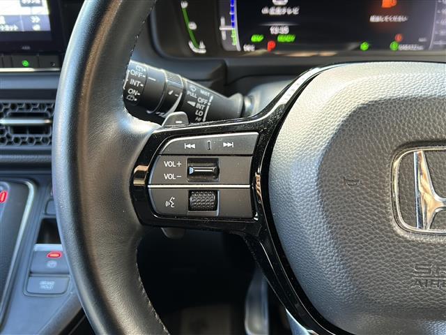 ステップワゴン ｅ：ＨＥＶスパーダ　禁煙　純正１１．４ナビ　バックカメラ　ＡＣ１００Ｖ１００Ｗ電源　パワーテールゲート　シートヒーター　オットマン　コンビシート　ＥＴＣ２．０　トリプルゾーンエアコン　ホンダセンシング　コーナーセンサー（7枚目）