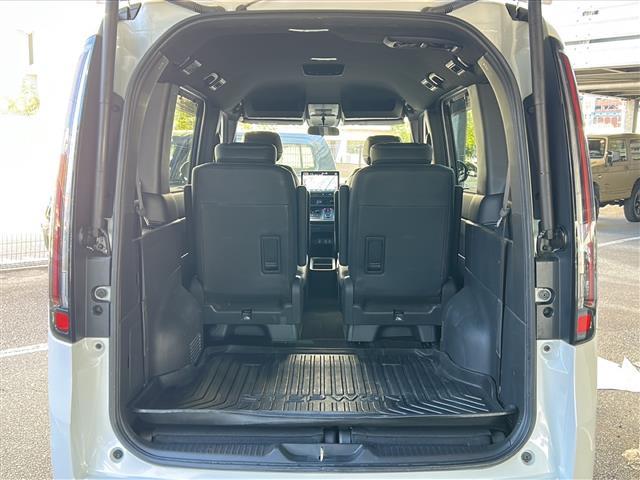 ステップワゴン ｅ：ＨＥＶスパーダ　禁煙　純正１１．４ナビ　バックカメラ　ＡＣ１００Ｖ１００Ｗ電源　パワーテールゲート　シートヒーター　オットマン　コンビシート　ＥＴＣ２．０　トリプルゾーンエアコン　ホンダセンシング　コーナーセンサー（27枚目）