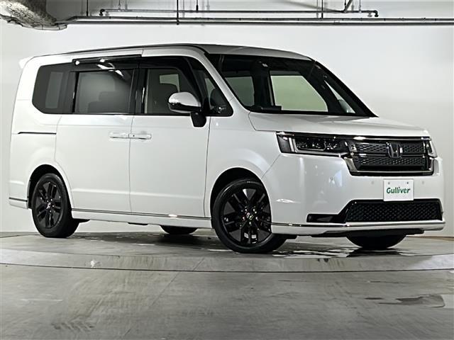 ステップワゴン ｅ：ＨＥＶスパーダ　禁煙　純正１１．４ナビ　バックカメラ　ＡＣ１００Ｖ１００Ｗ電源　パワーテールゲート　シートヒーター　オットマン　コンビシート　ＥＴＣ２．０　トリプルゾーンエアコン　ホンダセンシング　コーナーセンサー（29枚目）