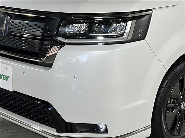 ステップワゴン ｅ：ＨＥＶスパーダ　禁煙　純正１１．４ナビ　バックカメラ　ＡＣ１００Ｖ１００Ｗ電源　パワーテールゲート　シートヒーター　オットマン　コンビシート　ＥＴＣ２．０　トリプルゾーンエアコン　ホンダセンシング　コーナーセンサー（33枚目）