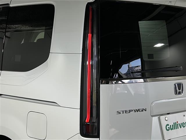 ステップワゴン ｅ：ＨＥＶスパーダ　禁煙　純正１１．４ナビ　バックカメラ　ＡＣ１００Ｖ１００Ｗ電源　パワーテールゲート　シートヒーター　オットマン　コンビシート　ＥＴＣ２．０　トリプルゾーンエアコン　ホンダセンシング　コーナーセンサー（34枚目）