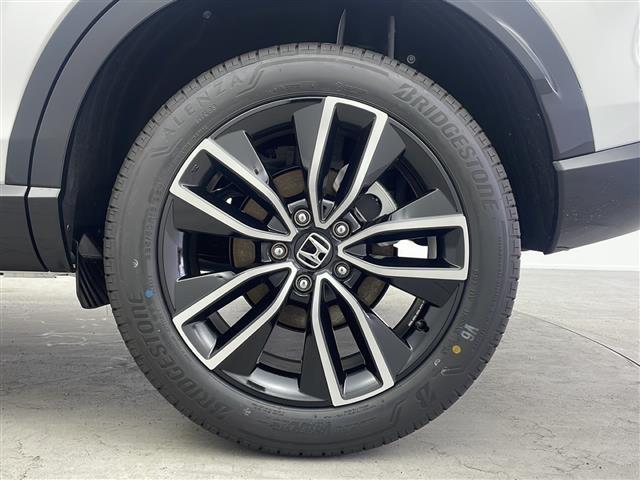 ヴェゼル e:HEV Z 登録済未使用車 純正9インチナビ付ディスプレイ バックカメラ フルセグTV ビルトインETC2.0 パワーバックドア 置くだけ充電 電動パーキングブレーキ 衝突軽減ブレーキ ブラインドスポットモニター(21枚目)