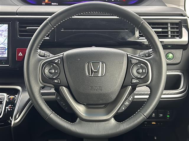 ステップワゴンスパーダ スパーダハイブリッド G・EX ホンダセンシング 純正9インチインターナビ 社外後席フリップダウンモニター 全方位カメラ パーキングアシスト ホンダセンシング 追従クルーズコントロール 両側パワースライドドア ハーフレザーシート シートヒーター(7枚目)