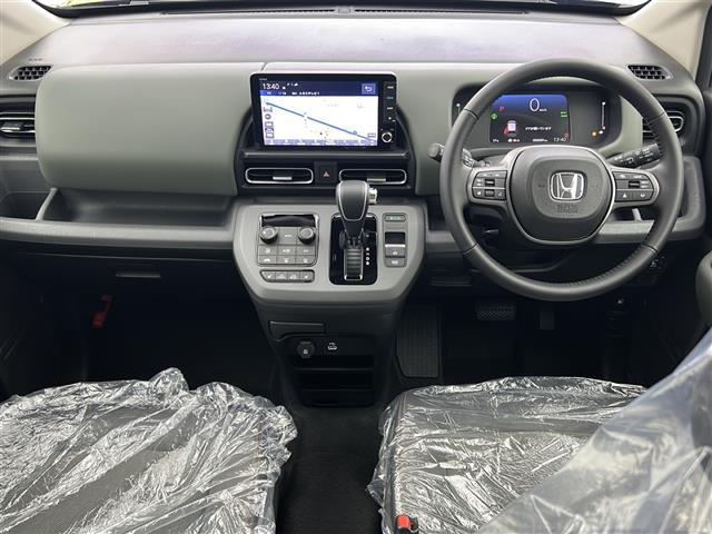 フリード e:HEVクロスター 登録済未使用車 純正9インチSDナビ バックカメラ 両側パワースライドドア 衝突被害軽減システム ブラインドスポットモニター 衝突被害軽減システム ハーフレザーシート シートヒータ コーナーセンサー(42枚目)