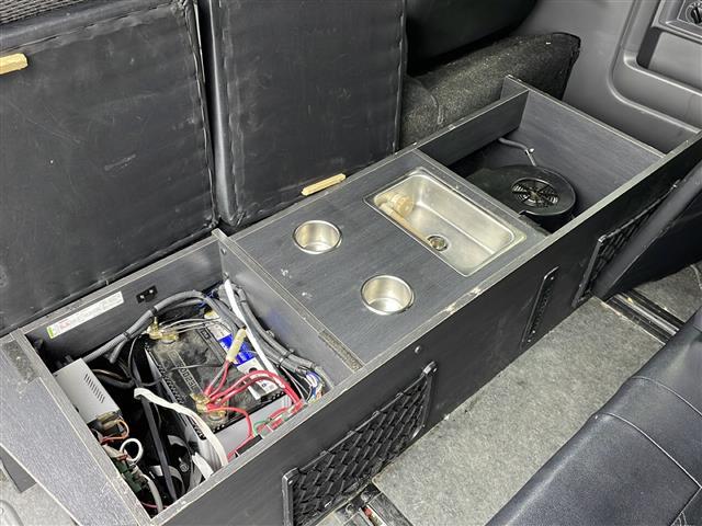 ＮＶ３５０キャラバンワゴン ＤＸ　キャンピング仕様　ベットキット　サブバッテリー　デジタルインナーミラー　簡易シンク　サブウーファー　スピーカー増設アルパイン　ハイルーフ　ＬＥＤヘッドライト　ＬＥＤフォグランプ　ＥＴＣ　電子レンジ（15枚目）