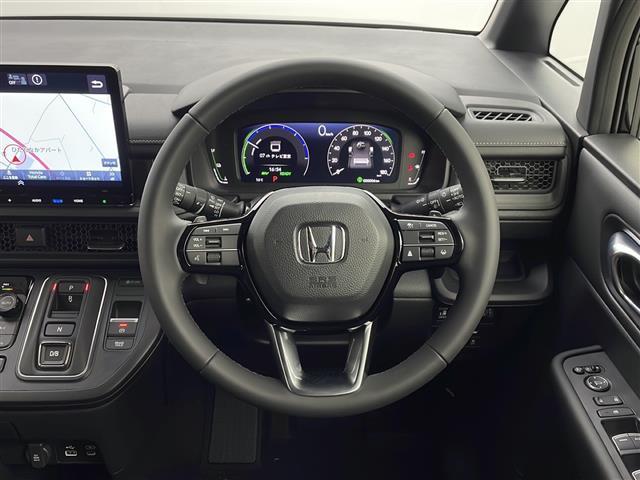 ステップワゴン ｅ：ＨＥＶスパーダ　登録済未使用車　純正１１型ナビ　フルセグＴＶ　バックモニター　両側電動スライドドア　追従クルコン　ＬＥＤライト　フォグランプ　シートヒーター　衝突被害軽減ブレーキ　１５．６型後席モニター　スマートキー（24枚目）