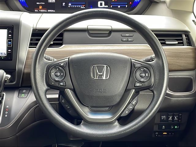 フリード Ｇ・ホンダセンシング　純正ナビ【ＶＸＭ２１４－ＶＦｉ】　両側パワースライドドア　バックカメラ　フルセグＴＶ　ブルートゥース　ＣＤ・ＤＶＤ　ホンダセンシング　衝突軽減ブレーキ　純正フロアマット　ＥＴＣ　スペアキー　保証書（9枚目）