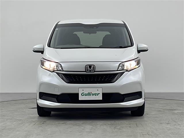 フリード Ｇ・ホンダセンシング　純正ナビ【ＶＸＭ２１４－ＶＦｉ】　両側パワースライドドア　バックカメラ　フルセグＴＶ　ブルートゥース　ＣＤ・ＤＶＤ　ホンダセンシング　衝突軽減ブレーキ　純正フロアマット　ＥＴＣ　スペアキー　保証書（27枚目）