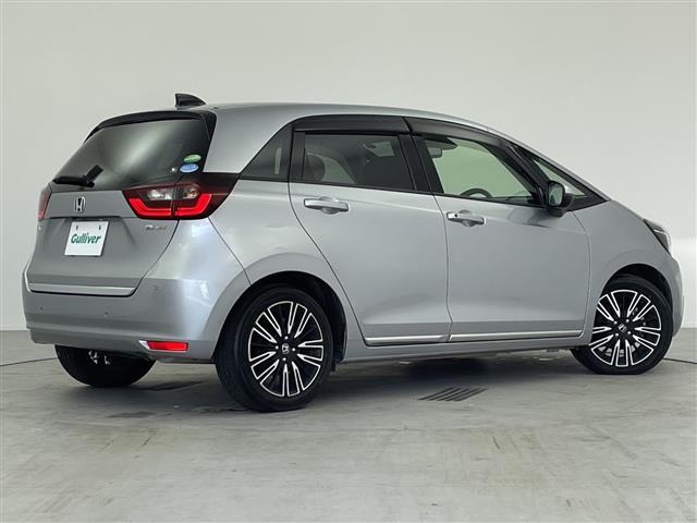 フィット e:HEVリュクス 純正9インチナビ/CD DVD BT SD FM AM/フルセグTV/バックカメラ/ホンダセンシング/アダプティブクルーズコントロール/衝突被害軽減システム/スペアキー/ハーフレザーシート(16枚目)