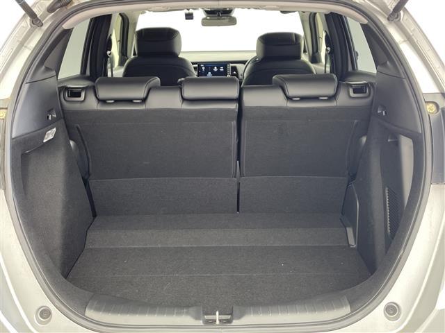 フィット e:HEVリュクス 純正9インチナビ/CD DVD BT SD FM AM/フルセグTV/バックカメラ/ホンダセンシング/アダプティブクルーズコントロール/衝突被害軽減システム/スペアキー/ハーフレザーシート(24枚目)