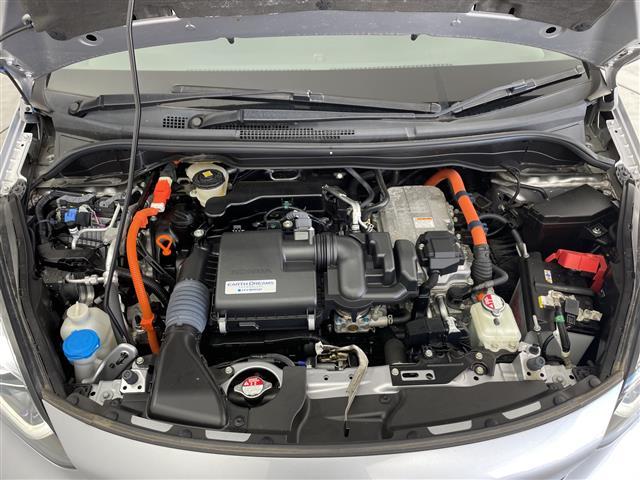 フィット e:HEVリュクス 純正9インチナビ/CD DVD BT SD FM AM/フルセグTV/バックカメラ/ホンダセンシング/アダプティブクルーズコントロール/衝突被害軽減システム/スペアキー/ハーフレザーシート(25枚目)