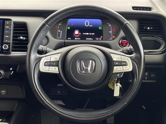 フィット e:HEVリュクス 純正9インチナビ/CD DVD BT SD FM AM/フルセグTV/バックカメラ/ホンダセンシング/アダプティブクルーズコントロール/衝突被害軽減システム/スペアキー/ハーフレザーシート(42枚目)