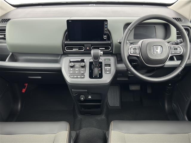 フリード e:HEVクロスター 登録済未使用車/車線逸脱抑制機能/ACC/メーカーOPナビ/バックカメラ/フルセグ/両側パワースライドドア/ハーフレザーシート/シートヒーター/LEDヘッドライト/純正15インチAW/ワイパーデアイサ(2枚目)