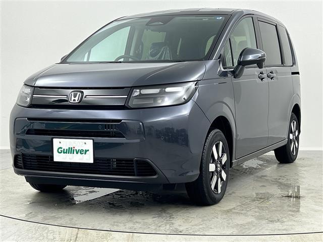 フリード ｅ：ＨＥＶエアー　ＥＸ　登録済未使用車　４ＷＤ　両側パワースライドドア　レーダークルーズコントロール　ＢＳＭ　純正９型ナビ　フルセグＴＶ　スマホ連動　クリアランスソナー　シートヒーター　バックカメラ　オートハイビーム　ＬＥＤ（18枚目）