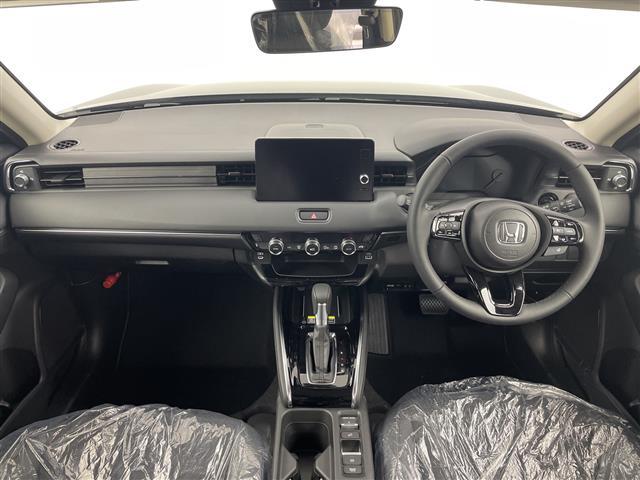 ヴェゼル ｅ：ＨＥＶ　Ｚ　登録済未使用車／／ホンダセンシング／純正９型ナビ／スマホ連携／フルセグＴＶ／バックカメラ／電動リアゲート／ハーフレザーシート／シートヒーター／パドルシフト／スペアキー／ＥＴＣ２．０／ワイヤレス充電（2枚目）