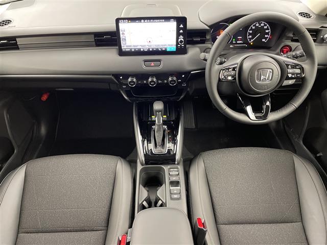 ヴェゼル ｅ：ＨＥＶ　Ｚ　登録済未使用車／／ホンダセンシング／純正９型ナビ／スマホ連携／フルセグＴＶ／バックカメラ／電動リアゲート／ハーフレザーシート／シートヒーター／パドルシフト／スペアキー／ＥＴＣ２．０／ワイヤレス充電（2枚目）