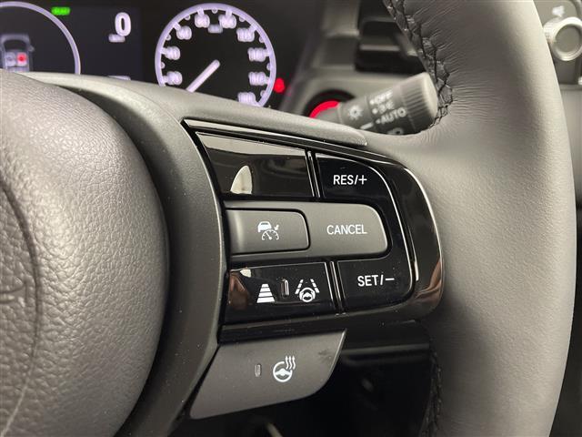 ヴェゼル ｅ：ＨＥＶ　Ｚ　登録済未使用車／／ホンダセンシング／純正９型ナビ／スマホ連携／フルセグＴＶ／バックカメラ／電動リアゲート／ハーフレザーシート／シートヒーター／パドルシフト／スペアキー／ＥＴＣ２．０／ワイヤレス充電（4枚目）