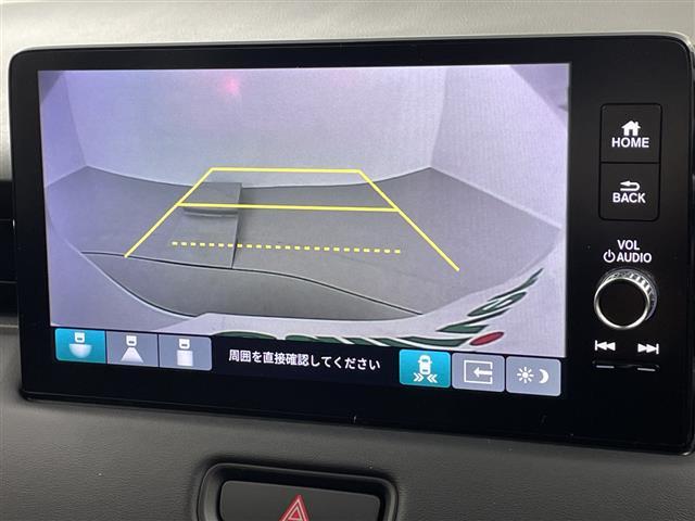 ヴェゼル ｅ：ＨＥＶ　Ｚ　登録済未使用車／／ホンダセンシング／純正９型ナビ／スマホ連携／フルセグＴＶ／バックカメラ／電動リアゲート／ハーフレザーシート／シートヒーター／パドルシフト／スペアキー／ＥＴＣ２．０／ワイヤレス充電（6枚目）