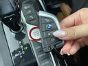 320d xDrive Mスポーツ 禁煙車 4WD 純正ナビ 全周囲カメラ 電動バックドア アクティブクルーズコントロール フルセグTV 前後ドライブレコーダー 前席パワーシート シートヒーター Wエアコン 純正AW付サマータイヤ車載(28枚目)