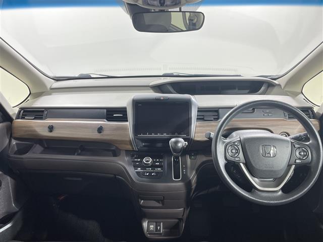 フリード Ｇ・ホンダセンシング　純正９型ＳＤナビ　両側電動　バックカメラ　ＬＥＤヘッドライト　ＥＴＣ　シートヒーター　ドライブレコーダー　スマートキー　クルーズコントロール　フロアマット　スペアキー　オートライト　プッシュスタート（2枚目）