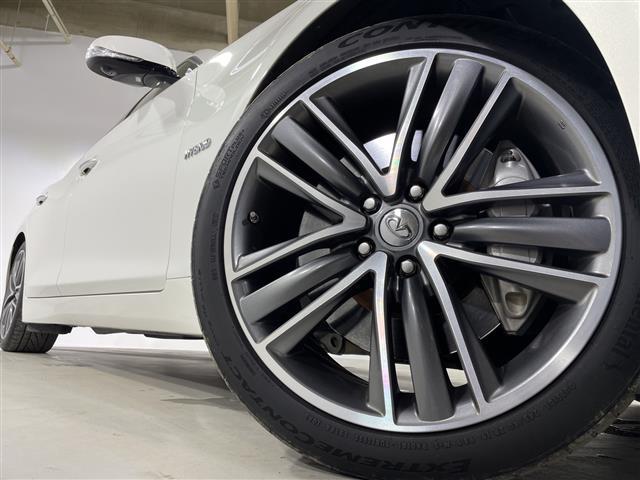 スカイライン ３５０ＧＴ　ハイブリッド　タイプＳＰ　純正ナビ　全周囲カメラ　全方位運転支援システム　クルーズコントロール　メモリーシート　レザーシート　パワーシート　シートヒーター　スペアキー１本　ステアリングリモコン　ビルトインＥＴＣ　純正１９ＡＷ（39枚目）