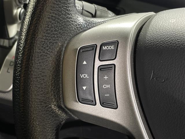 フリードハイブリッド ジャストセレクション　純正ナビ　両側スライドドア　バックカメラ　ＥＴＣ　クルーズコントロール　スマートキー　純正１５インチＡＷ　横滑り防止装置　アイドリングストップ　オートライト　電格格納ミラー　フロアマット（7枚目）