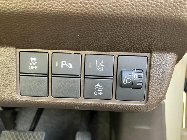 N-WGN Lホンダセンシング ETC装備 Bモニタ 誤発進抑制 ブルートゥースオーディオ 車線逸脱防止 シートヒータ 衝突安全ボディ オートライト オートハイビーム DVD フルセグ 横滑り防止機能 USBポート キーフリー SD(12枚目)