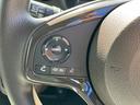 Lホンダセンシング ETC装備 レンタUP Bモニタ 誤発進抑制 ブルートゥースオーディオ 車線逸脱防止 ナビ シートヒータ 衝突安全ボディ オートライト オートハイビーム DVD 横滑り防止機能 USBポート SD(38枚目)