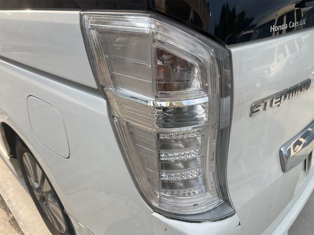 ステップワゴンスパーダ Z ETC バックカメラ TV オートクルーズコントロール 両側電動スライドドア オートライト HID スマートキー アイドリングストップ 電動格納ミラー 後席モニター 3列シート CVT アルミホイール(18枚目)