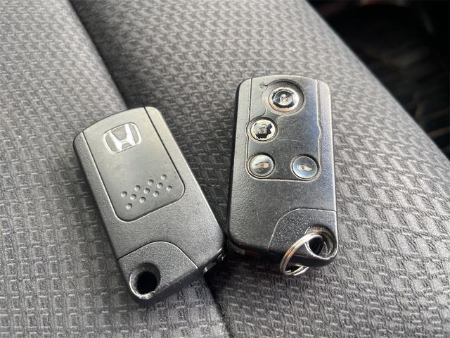 ステップワゴンスパーダ Z ETC バックカメラ TV オートクルーズコントロール 両側電動スライドドア オートライト HID スマートキー アイドリングストップ 電動格納ミラー 後席モニター 3列シート CVT アルミホイール(37枚目)