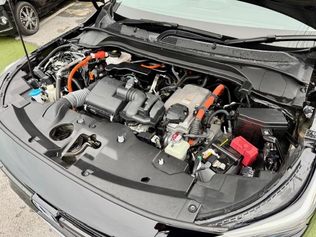 ヴェゼル ｅ：ＨＥＶ　Ｚ　ＯＰ１０年保証対象車　純正ナビ　パワーバックドア　ハーフレザー　ドラレコ前後　コーナーセンサー　電動パーキング　ブレーキホールド　置くだけ充電　レーダークルーズコントロール　シートヒーター　ＢＳＭ（8枚目）