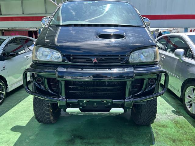 デリカスペースギア 　４ＷＤ車　リフトアップ　Ａ／Ｃ付き　シートカバー　オートマチック　アームレスト　内外装仕上げ済み　委託預かり車両　沖縄中古の為エンジン内部多少サビ腐食有り（12枚目）