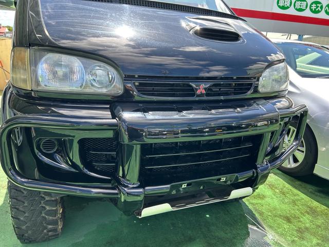 デリカスペースギア 　４ＷＤ車　リフトアップ　Ａ／Ｃ付き　シートカバー　オートマチック　アームレスト　内外装仕上げ済み　委託預かり車両　沖縄中古の為エンジン内部多少サビ腐食有り（13枚目）