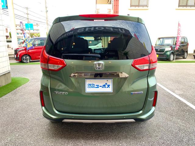 フリードハイブリッド ハイブリッド・クロスターホンダセンシング OP10年保証対象車 純正9インチナビ 前後ドライブレコーダー ハーフレザーシート ビルトインETC 両側パワースライドドア LEDヘッドライト レーダークルーズコントロール シートヒーター(6枚目)