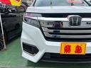 ステップワゴンスパーダ e:HEVスパーダ G・EX ホンダセンシング ホンダセンシング ホンダ純正ワイドナビ フルセグ Bluetooth DVD バックモニター アップルカーペイ ホンダ純正フリップダウン 両側パワースライドドア前後ドライブレコーダーハーフレザーシート 中古車画像_3